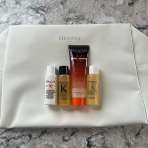 Kerastase White Leather Makeup bag with four Kerastase products